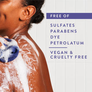 Person lathering in shower with text reading “Free of sulfates, parabens,  dye, petrolatum, vegan & cruelty free”