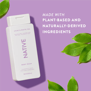 Native Lilac & White Tea Body Wash with text reading “Made with plant-based and naturally-derived ingredients” next to green leaves