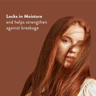 Woman with long red hair with text reading “Locks in moisture and helps strengthen against breakage”