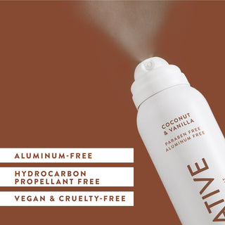 Native Coconut & Vanilla deodorant laid flat on brown background with text "Aluminum-free, hydrocarbon propellant free, vegan & cruelty-free"	
