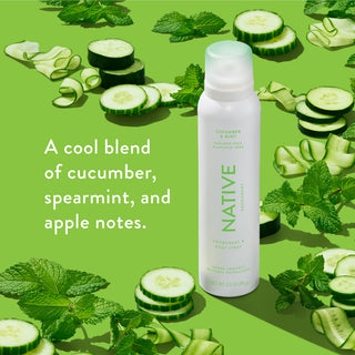 Native deodorant spray with text saying "A cool blend of cucumber, spearmint, and apple notes", styled with cucumber slices