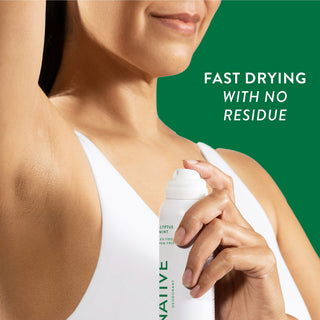 Person applying Native deodorant spray under arm with text fast drying with no residue