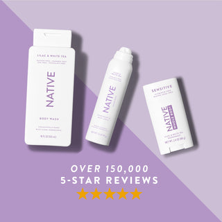 Native body wash, deodorant spray, and deodorant stick in Lilac & White Tea scent shown with five-star rating