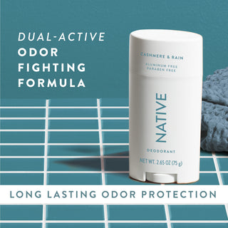 Native Cashmere & Rain Deodorant sitting on counter with text promoting "Dual-active, odor fighting formula"