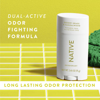 Native Desert Grass & Sandalwood Deodorant sitting on counter with text promoting "Dual-active, odor fighting formula"
