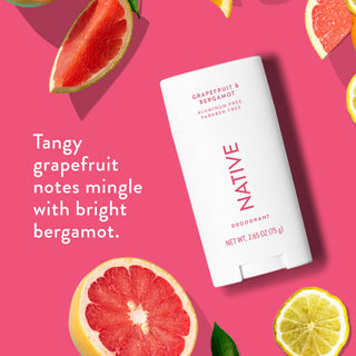 Native deodorant with text saying "Tangy grapefruit notes mingle with bright bergamot", styled with grapefruit and bergamot slices