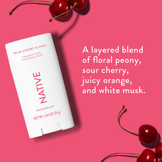 Native deodorant with text saying "A layered blend of floral peony, sour cherry, juicy orange, and white musk", styled with wild cherries
