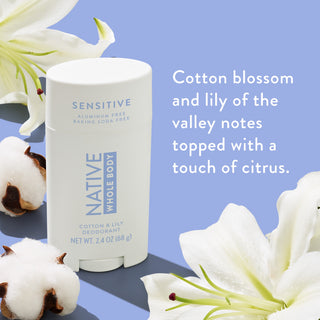 Native Whole Body Deodorant with cotton flower and lilies on bleu background