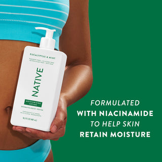 Woman holding Native Eucalyptus & Mint Moisturizing Lotion bottle with text reading "Formulated with niacinamide to help skin retain moisture"