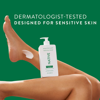 Native Eucalyptus & Mint Moisturizing Lotion bottle on a person’s legs, promoting “Dermatologist-Tested designed for sensitive skin”