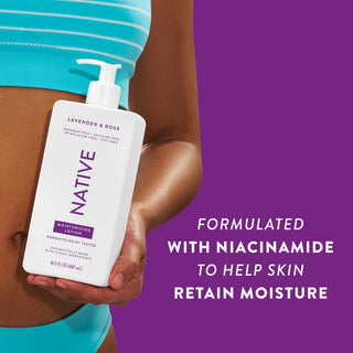Woman holding Native Lavender & Rose Moisturizing Lotion bottle with text reading "Formulated with niacinamide to help skin retain moisture"