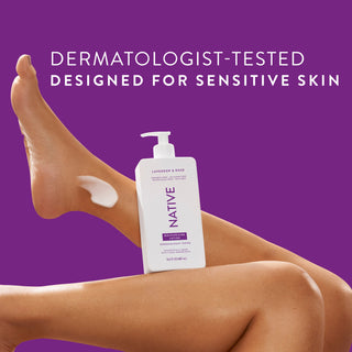 Native Lavender & Rose Moisturizing Lotion bottle on a person’s legs, promoting “Dermatologist-Tested designed for sensitive skin”