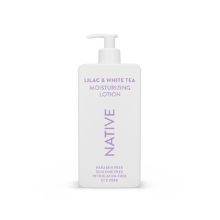 Native Lilac & White Tea Moisturizing Lotion bottle, highlighting paraben free, silicone free, petrolatum free, and dye free