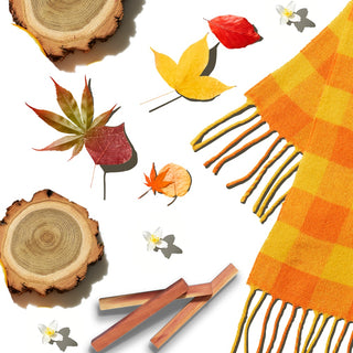 Wool scarf, wood pieces, and assorted leaves and flowers