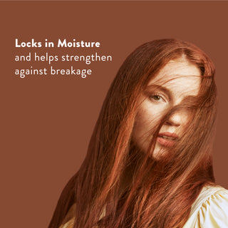 Woman with long red hair with text reading “Locks in moisture and helps strengthen against breakage”