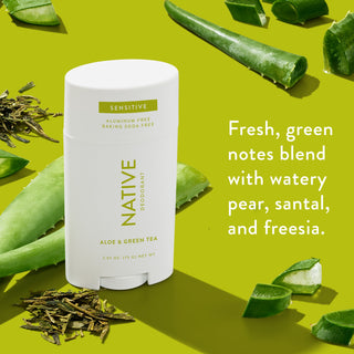 Native sensitive deodorant with text saying "Fresh, green notes blend with watery pear, santal, and freesia", styled with aloe vera leaves