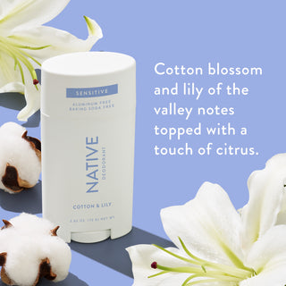Native sensitive deodorant with text saying "Cotton blossom and lily of the valley notes topped with a touch of citrus", styled with cotton flowers and white lilies
