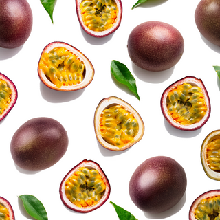 Arrangement of whole passion fruits and passion fruits sliced in half
