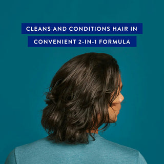 Woman with short black hair with text "Cleans and conditions hair in convenient 2-in-1 formula"