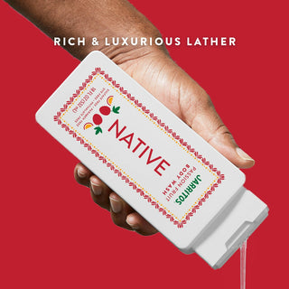 Hand pouring Native Jarritos - Passion Fruit Body Wash with text reading "Rich & luxurious lather"