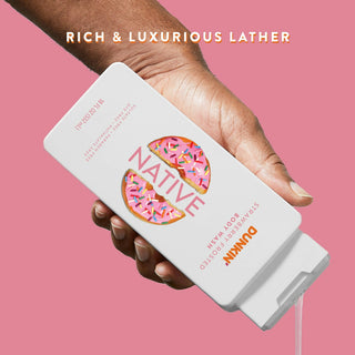 Hand pouring Native Dunkin - Strawberry Frosted Body Wash with Rich & luxurious lather text