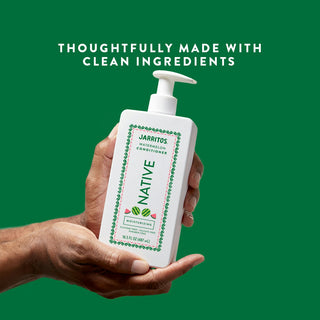 Hand holding Native Moisturizing Conditioner with text “Thoughtfully made with clean ingredients”